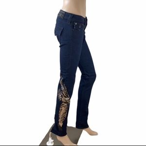 NWOT True Religion stage jeans. Dark wash,sequined eagle on one leg. Size 26